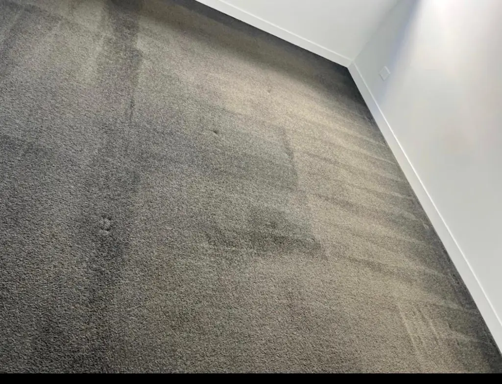 Cleaned living room and timber floor interior after bond cleaning Kingston